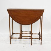 Satinwood, ebony and boxwood strung drop-leaf centre table on turned supports