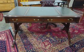 Mahogany reproduction writing desk, with leather inset and top above the two drawers and column