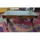 Mahogany reproduction writing desk, with leather inset and top above the two drawers and column