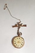 A lady's 14ct gold cased fob watch,enamel dial with Roman numerals, engraved on enamel case