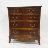 20th century mahogany bow fronted chest of two short  over three long drawers together with a wall