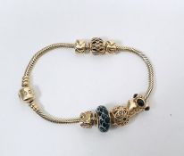 14ct gold Pandora herringbone bracelet with eight 14ct Pandora and other charms, including enamel