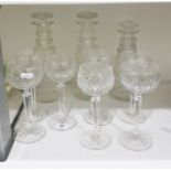 Pair of cut glass mallet-shaped decanters and stoppers, cut with a panel of diamond ornament, 27cm
