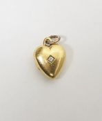 Gold-coloured metal and diamond heart-shaped locket set with old cut stone, 8g approx total