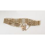 9ct gold four-bar gate bracelet with padlock clasp, 15.8g approx