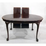 An early twentieth century mahogany cross banded D - end extending table on cabriole supports,