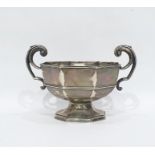 Silver two-handled bowl of octagonal form, with scroll handles, on a raised foot, Sheffield 1923,