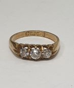 Edwardian 18ct gold three-stone diamond ring in open claw setting, set three old cut diamonds,