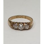 Edwardian 18ct gold three-stone diamond ring in open claw setting, set three old cut diamonds,