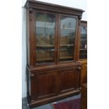 19th century mahogany bookcase cabinet, cavetto and cornice above glazed doors enclosing shelves