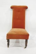 19th century orange ground prie dieu chair on turned front legs to white china castors