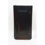 19th century mahogany wall hanging corner cupboard, single door enclosing shelves