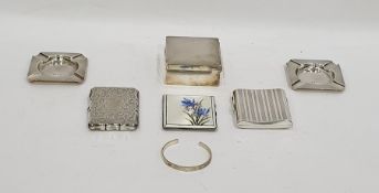 Silver and enamel cigarette case depicting irises, another cigarette case with engine-turned