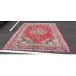 Mahal carpet with stepped central medallion on a red ground foliate field, foliate decorated