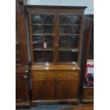 George III style mahogany secretaire bookcase, the upper section ogee choirs enclosed by pair of