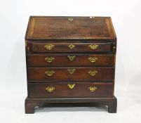 An 18th century mahogany bureau, the fall enclosing fitted interior above on four long graduated