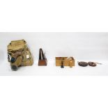 Gas mask by Siebe, Gorman & Co Ltd, a quantity of Players cigarette cards, a metronome, a part chess