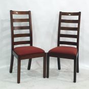 Set of six 20th century ladderback dining chairs with red upholstered seats (6)