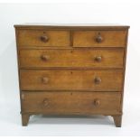 Late 19th century/ early 20th century oak chest, two short over three long drawers to bracket feet ,