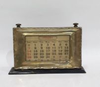 Silver framed desk calendar within an ebonised mount, Birmingham 1927, length 21cm