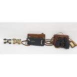 Kodak no 1 pocket folding camera with a brown leather case and a pair of Aquilus field glasses