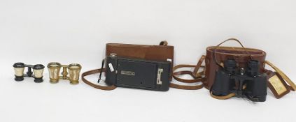 Kodak no 1 pocket folding camera with a brown leather case and a pair of Aquilus field glasses