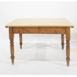 A pine rectangular dining table on four turned supports, 182cm