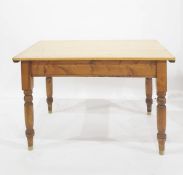 A pine rectangular dining table on four turned supports, 182cm