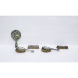 Victorian silver-backed dressing table set comprising of a pair of hairbushes, hand mirror and