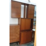 A mid 20th century teak lounge unit, and two sliding door teak cupboards (3)Condition Reporttop unit