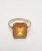 9ct gold dress ring set with orange square cut stone