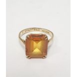 9ct gold dress ring set with orange square cut stone