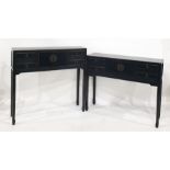 Two  hall tables, black-stained in the Oriental taste (2)