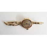 Old 9ct gold lady's wristwatch, by Texina, with spring loaded expanding braceletCondition Reportno