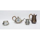 Silver four-piece tea service to include teapot, hot water pot, cream jug and sugar bowl, London