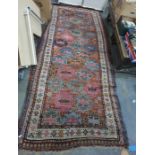 Eastern rug, brown rug with assorted hooked medallions in pinks, blues, taupe and yellows, stepped