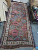 Eastern rug, brown rug with assorted hooked medallions in pinks, blues, taupe and yellows, stepped