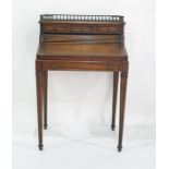 20th century mahogany bureau with three-quarter back galleried brass top, above three short drawers,
