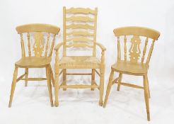 Pair of beech framed dining chairs and a beech framed ladderback carver chair with rush seat (3)