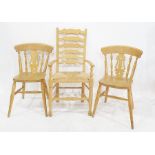 Pair of beech framed dining chairs and a beech framed ladderback carver chair with rush seat (3)