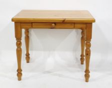 20th century pine side table with single drawer, on turned supports