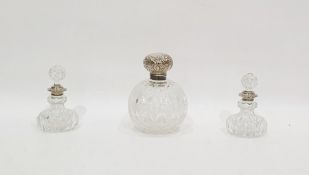 Edwardian silver-capped cut glass scent bottle of globular form, Birmingham 1905 and a pair of