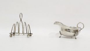 Edwardian silver four-division toast rack on ball feet, Chester 1903, 3oz approx and a silver