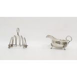 Edwardian silver four-division toast rack on ball feet, Chester 1903, 3oz approx and a silver