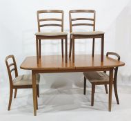 G- Plan teak extending dining table and a six G-Plan ladderback chairs with cream upholstered