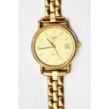 Lady's gilt stainless steel Longines quartz wristwatch 'Presence', the circular champagne face