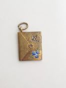 Gold-coloured metal envelope locket with enamel and small old cut diamond set to the front panel