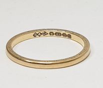 Fine 22ct gold wedding band with engraved decoration (worn), 2g approxCondition ReportThe ring