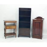 Walnut single door pot cupboard, an open bookcase with cupboard under on bracket feet and a three