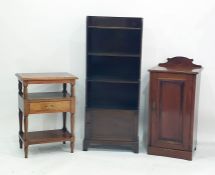 Walnut single door pot cupboard, an open bookcase with cupboard under on bracket feet and a three